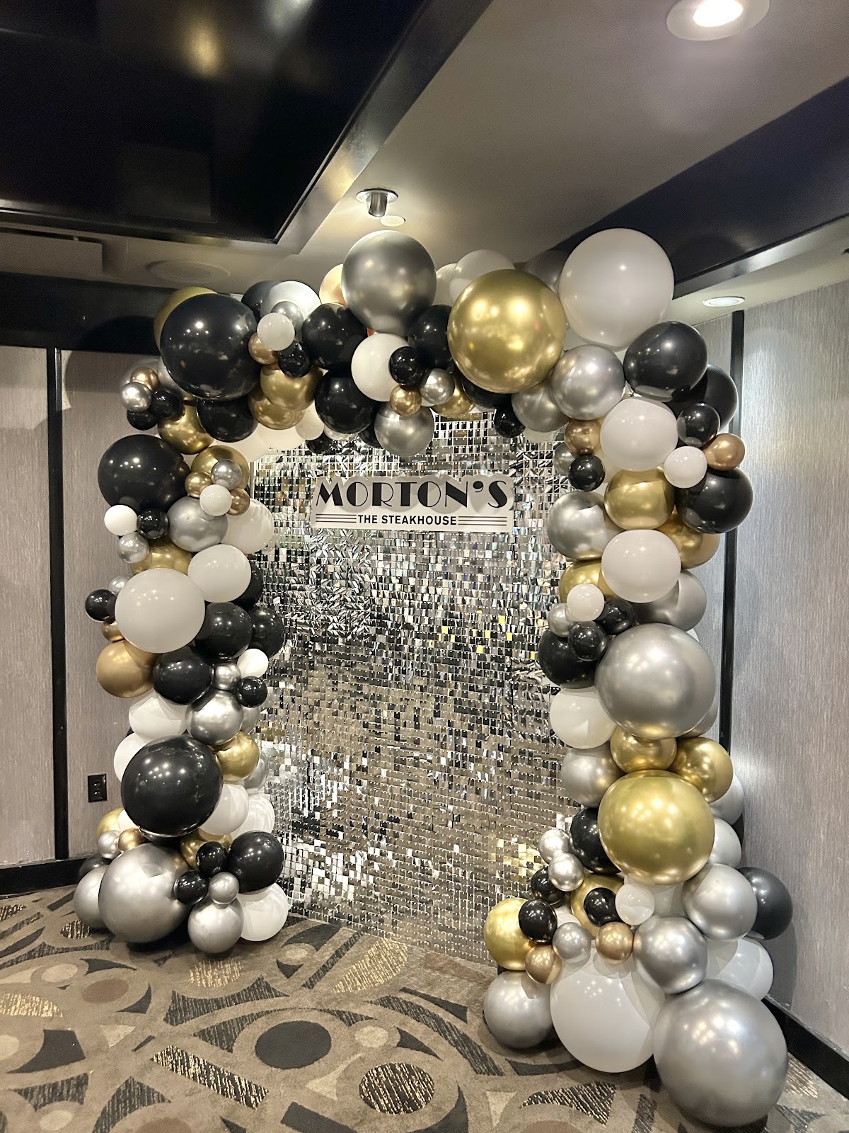Silver Shimmer Walls & Custom Signage